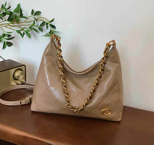 Classic Beige Quilted Leather Handbag with Gold Chain
